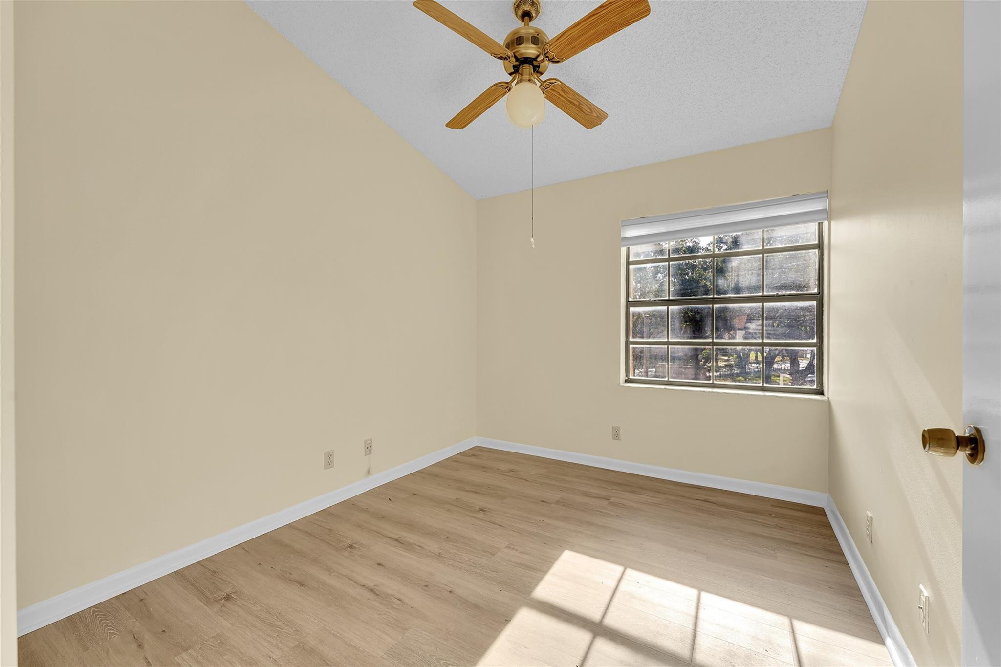 10761 Northwest 14th Street, Unit 281 Plantation, FL 33322 - Photo 23 of 33 an empty room with closet and windows