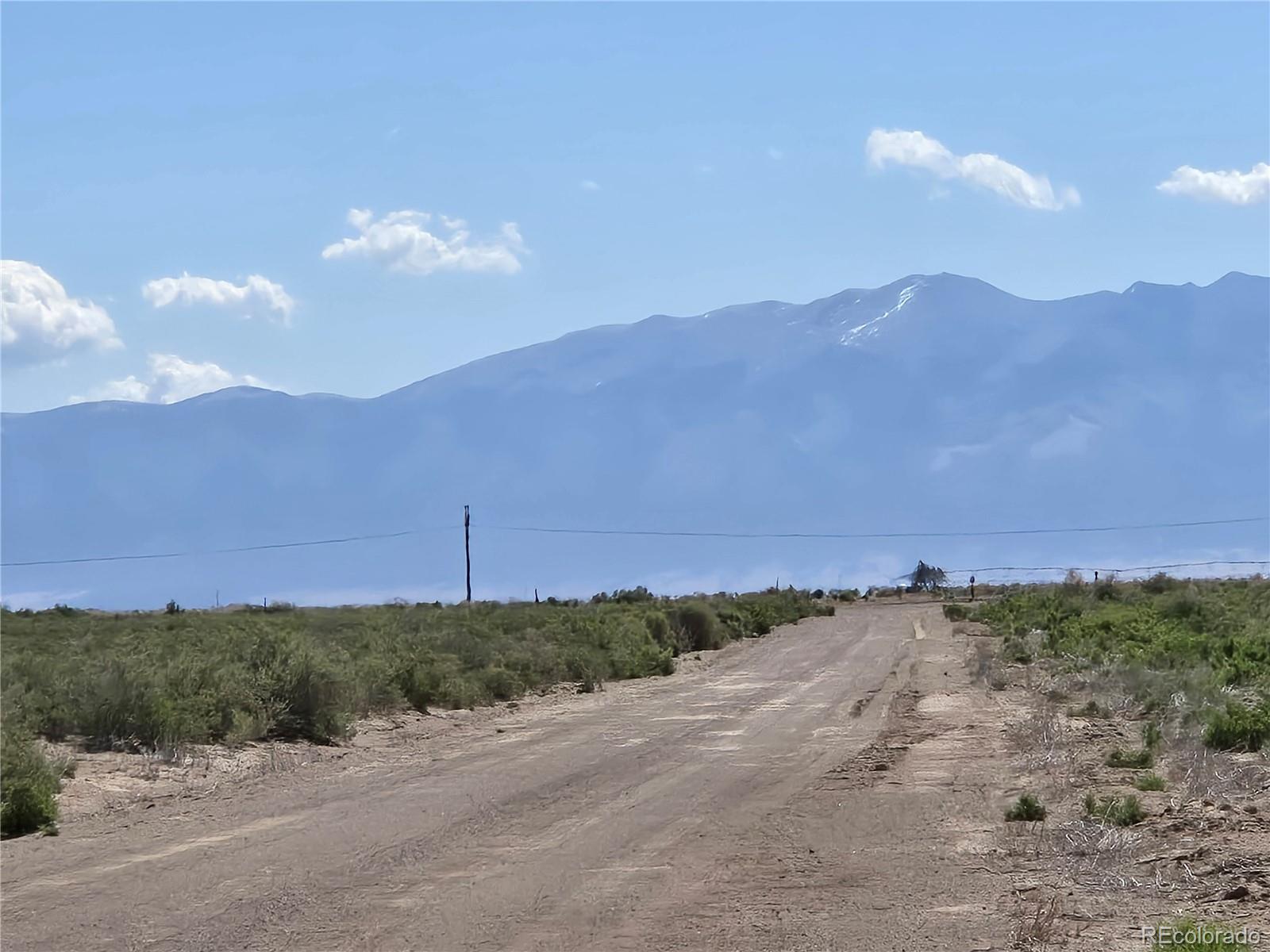 40 Acres Tbd Mosca, CO 81146 - Photo 7 of 13 a view of a dry yard with mountain
