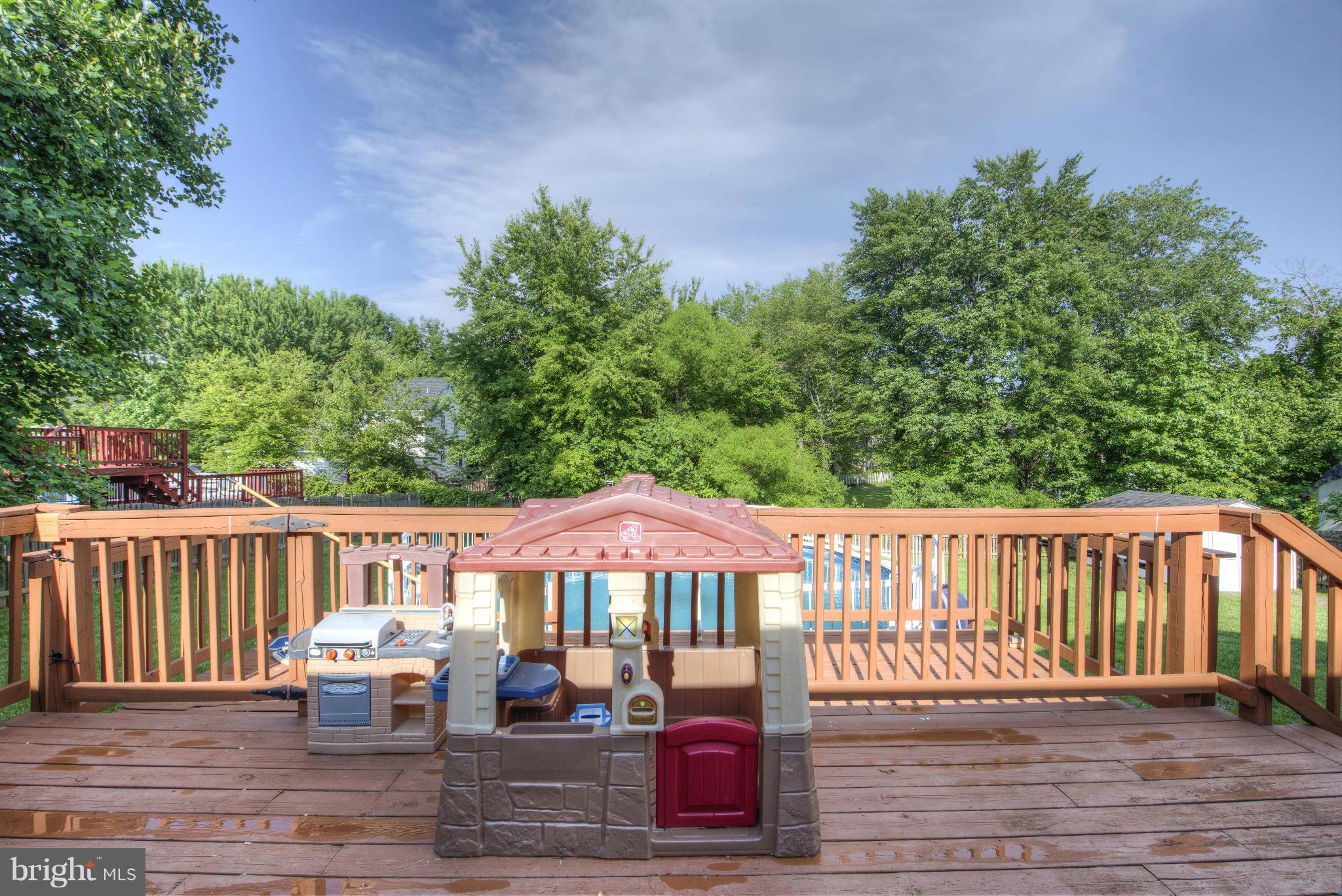 55 Buck Road Stafford, VA 22556 - Photo 17 of 19 a view of a table and chairs on the roof deck