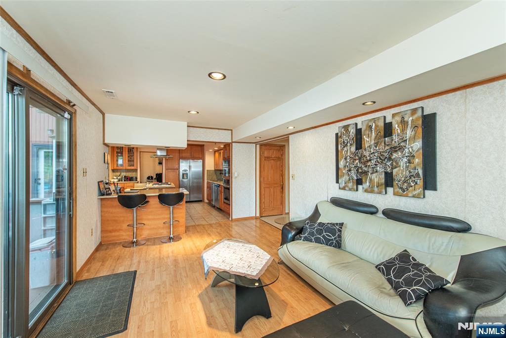 12 Abbott Road Wayne, NJ 07470 - Photo 10 of 49 a living room with furniture and wooden floor