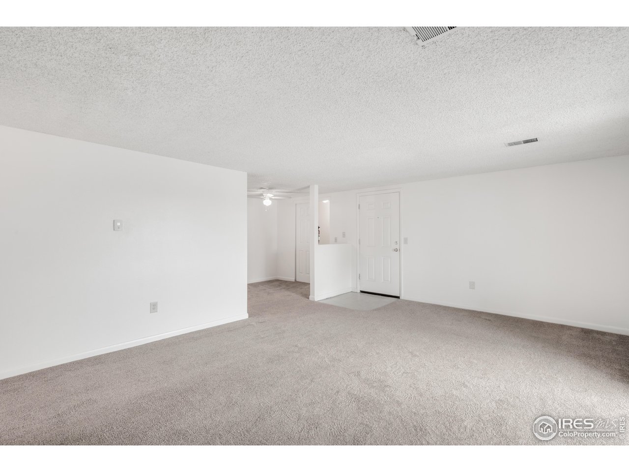 1817 26th Street Greeley, CO 80631 - Photo 8 of 29 a view of an empty room