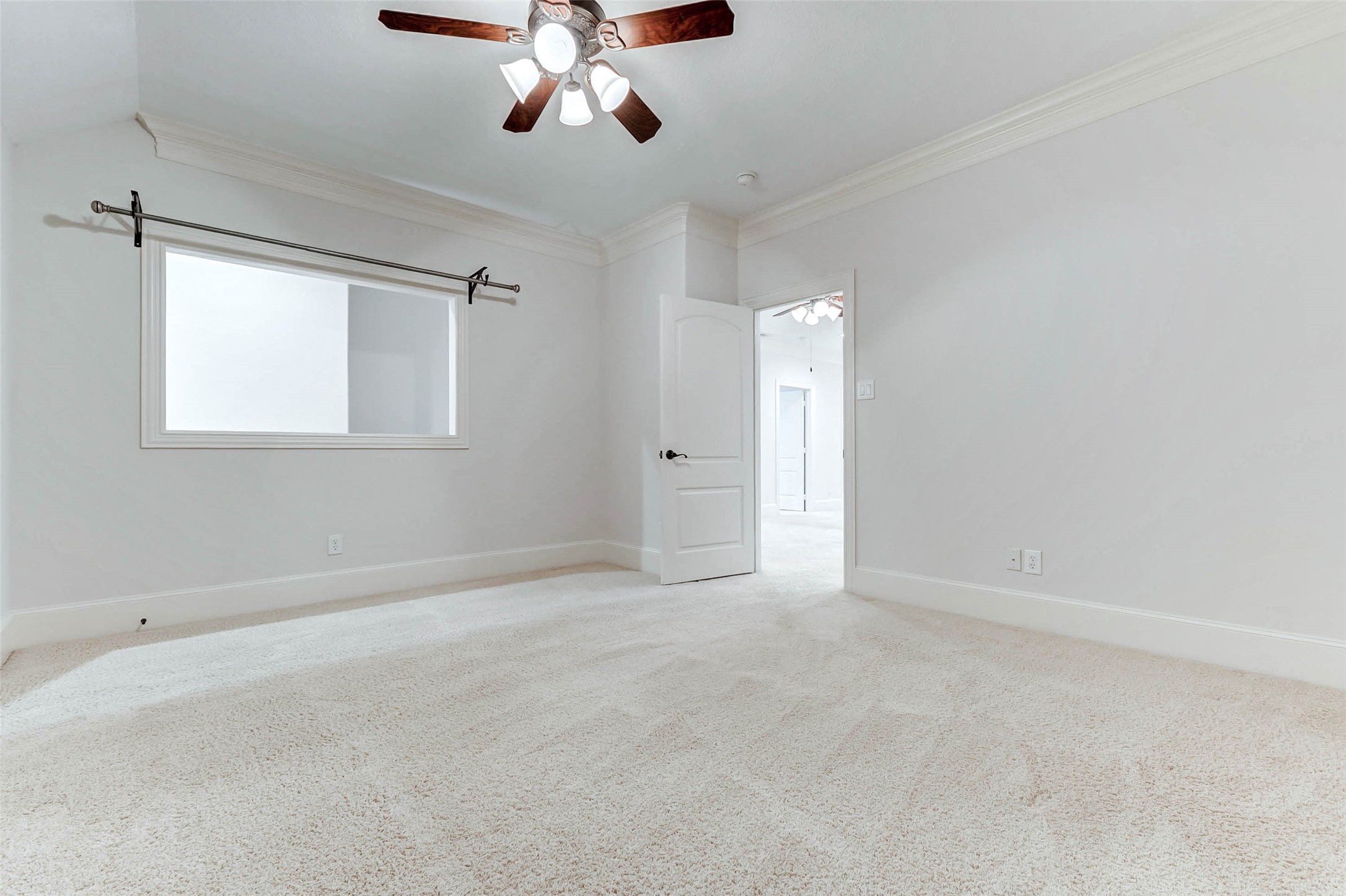 3509 Mirror Court Spring, TX 77388 - Photo 30 of 45 Guest bedroom number four is located upstairs and offers a spacious layout with soft carpeting, neutral tones, and a ceiling fan for added comfort.