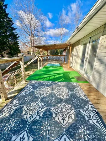 a view of a backyard with pathway