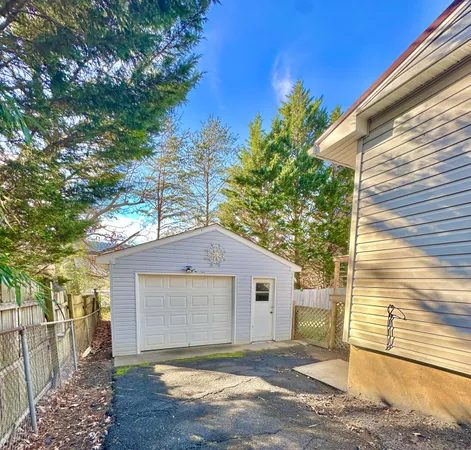 a front view of a house with a garage