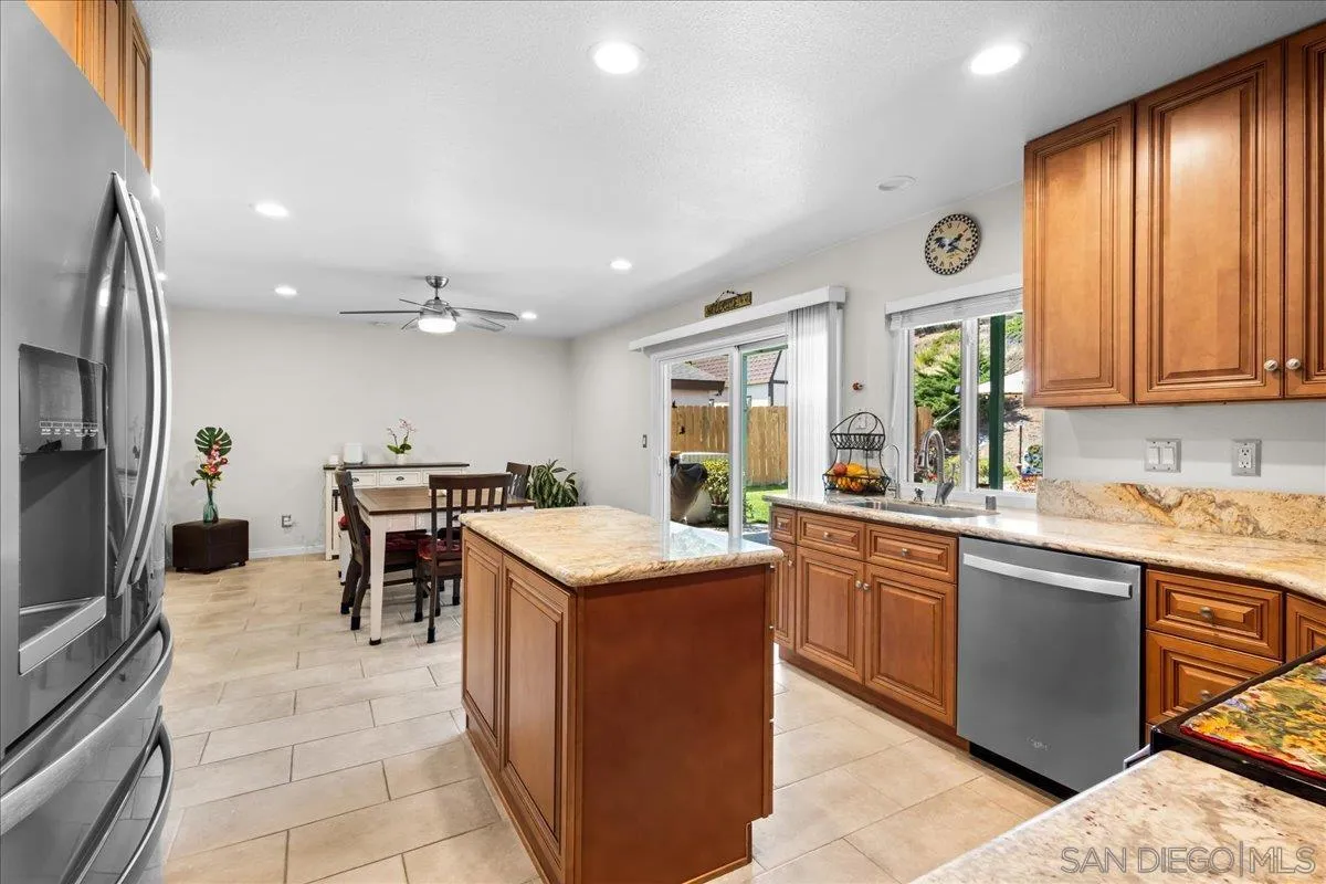 10738 2nd Street Santee, CA 92071 - Photo 7 of 52 a kitchen with lots of counter top space and appliances