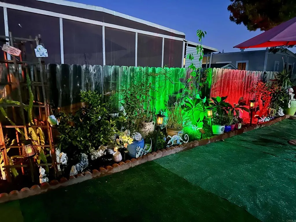 8301 Mission Gorge Road, Unit 162 Santee, CA 92071 - Photo 41 of 65 a view of a house with a backyard and garden