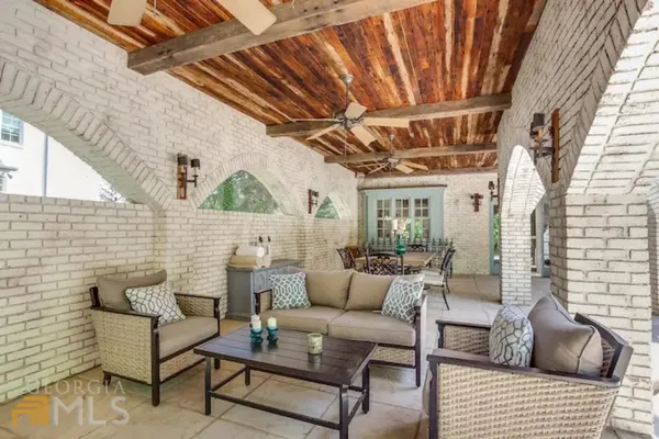 a building outdoor space with patio furniture