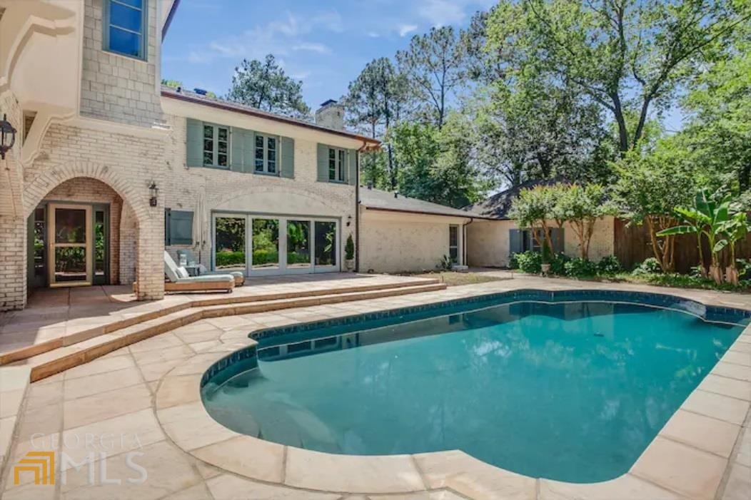 2510 Bohler Road Northwest Atlanta, GA 30327 - Photo 3 of 47 a view of a house with swimming pool