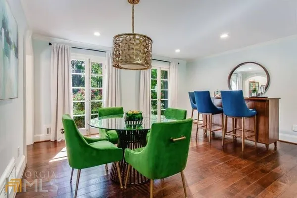 a view of a livingroom with furniture and window