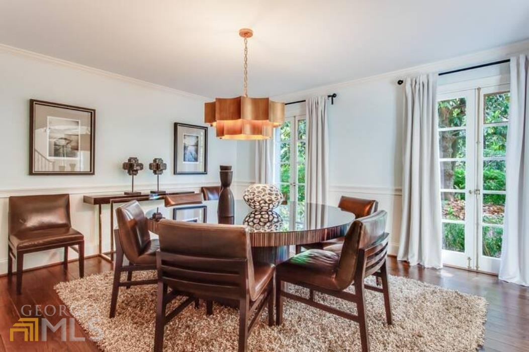 2510 Bohler Road Northwest Atlanta, GA 30327 - Photo 36 of 47 a view of a dining room with furniture window and wooden floor