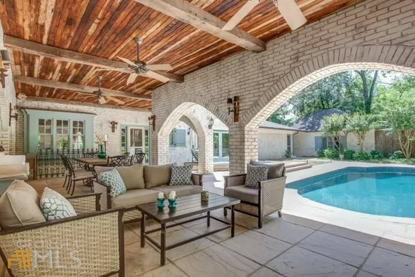 a outdoor living space with furniture and garden view