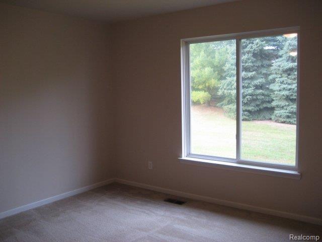 8083 Huntington Ridge Court, Unit 18 Washington, MI 48094 - Photo 15 of 25 Master_Bdrm.jpg