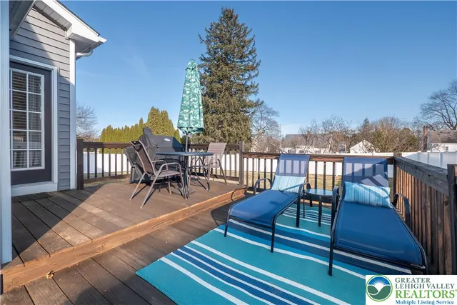a aerial view of a house with a yard