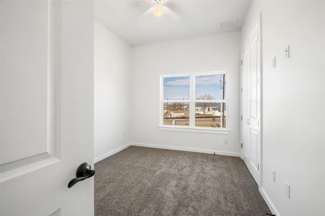 a bathroom with a bathtub and toilet