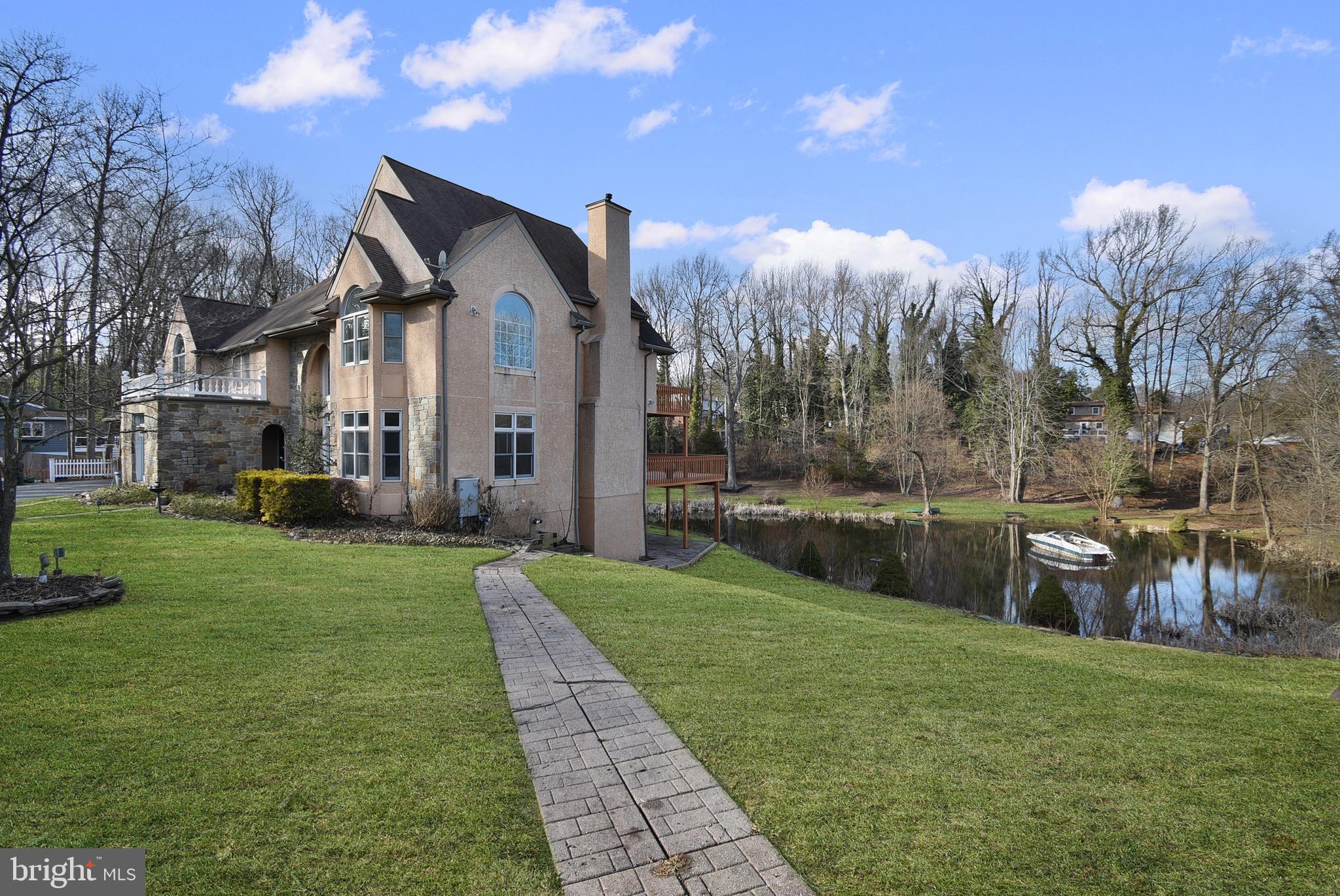 411 Marie Drive Wallingford, PA 19086 - Photo 43 of 44 Exterior Side w/ Water View