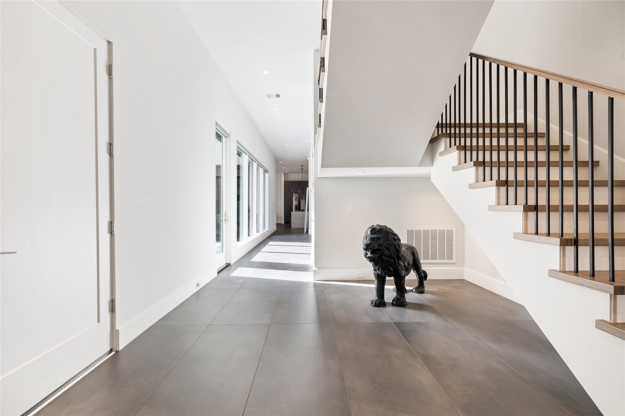 103 Roy Street Houston, TX 77007 - Photo 5 of 37 a view of a hallway with stairs