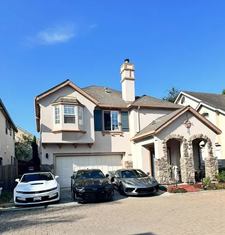 a car parked in front of a house