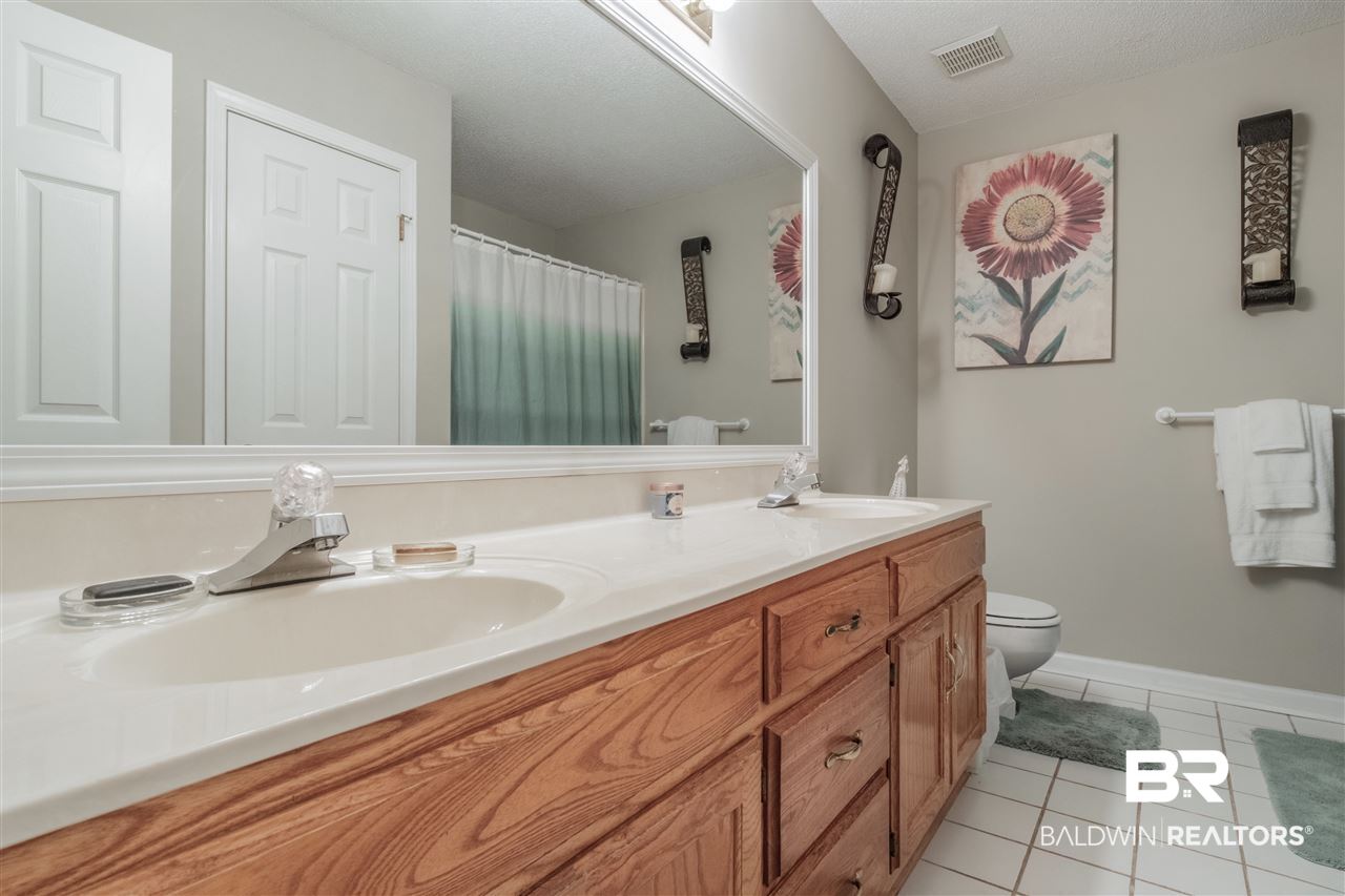7311 Cheryl Court Mobile, AL 36695 - Photo 28 of 46 Guest Bathroom