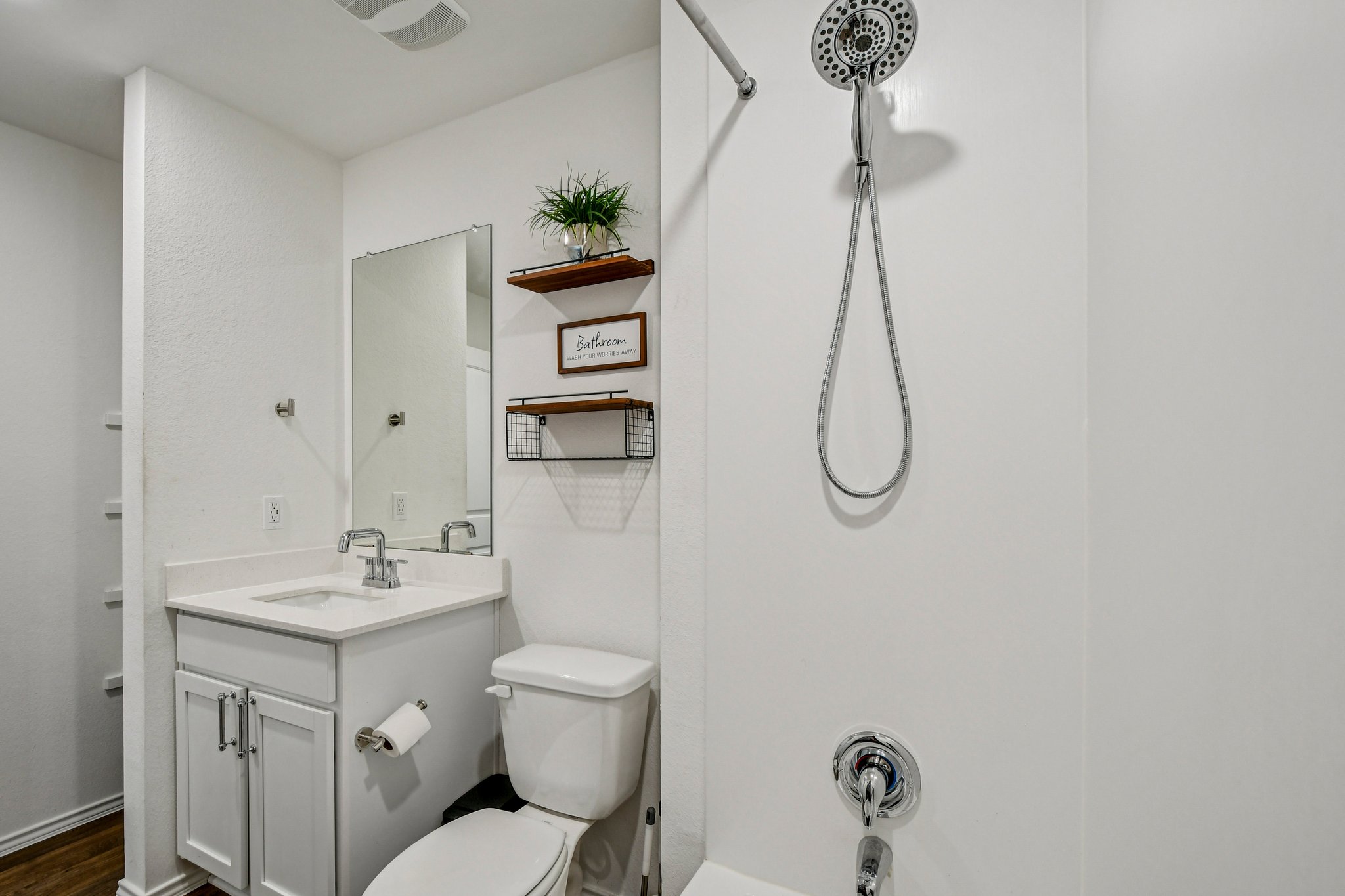 519 Sandringham Loop Kyle, TX 78640 - Photo 20 of 32 Bathroom featuring vanity and washtub / shower combination