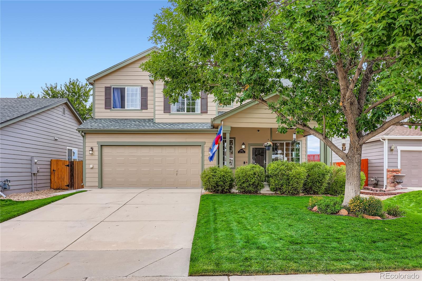 1005 Parsons Avenue Castle Rock, CO 80104 - Photo 1 of 38 a front view of house with yard and green space