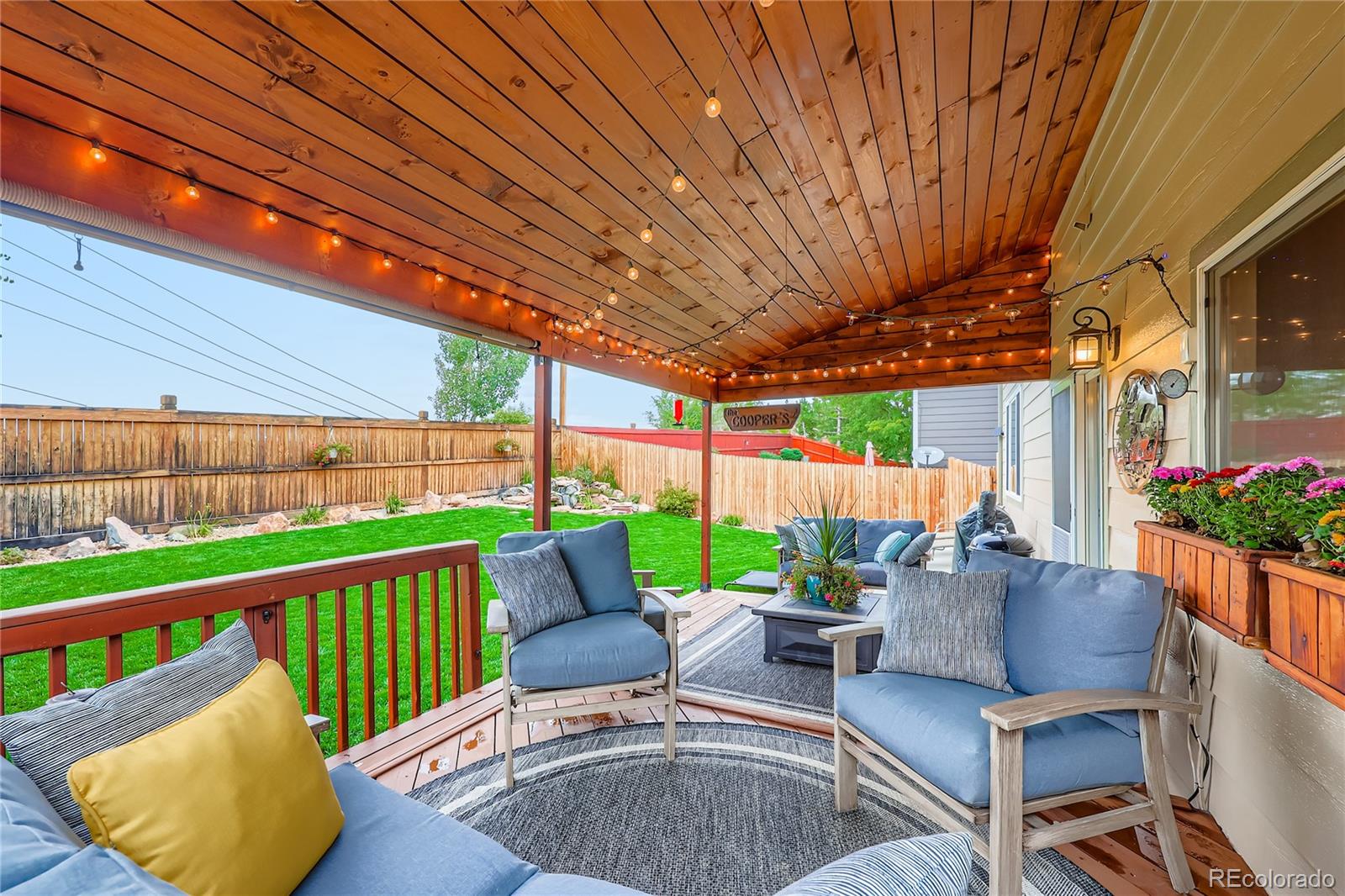 1005 Parsons Avenue Castle Rock, CO 80104 - Photo 23 of 38 a balcony with furniture and a garden