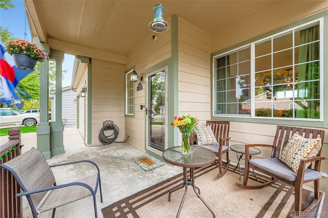a living room with furniture and window