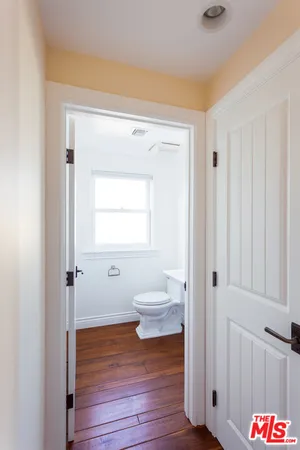 a view of a livingroom with wooden floor