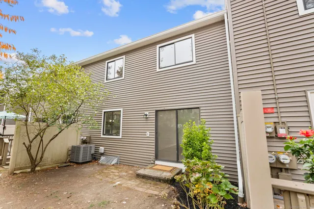 a view of balcony with wooden floor