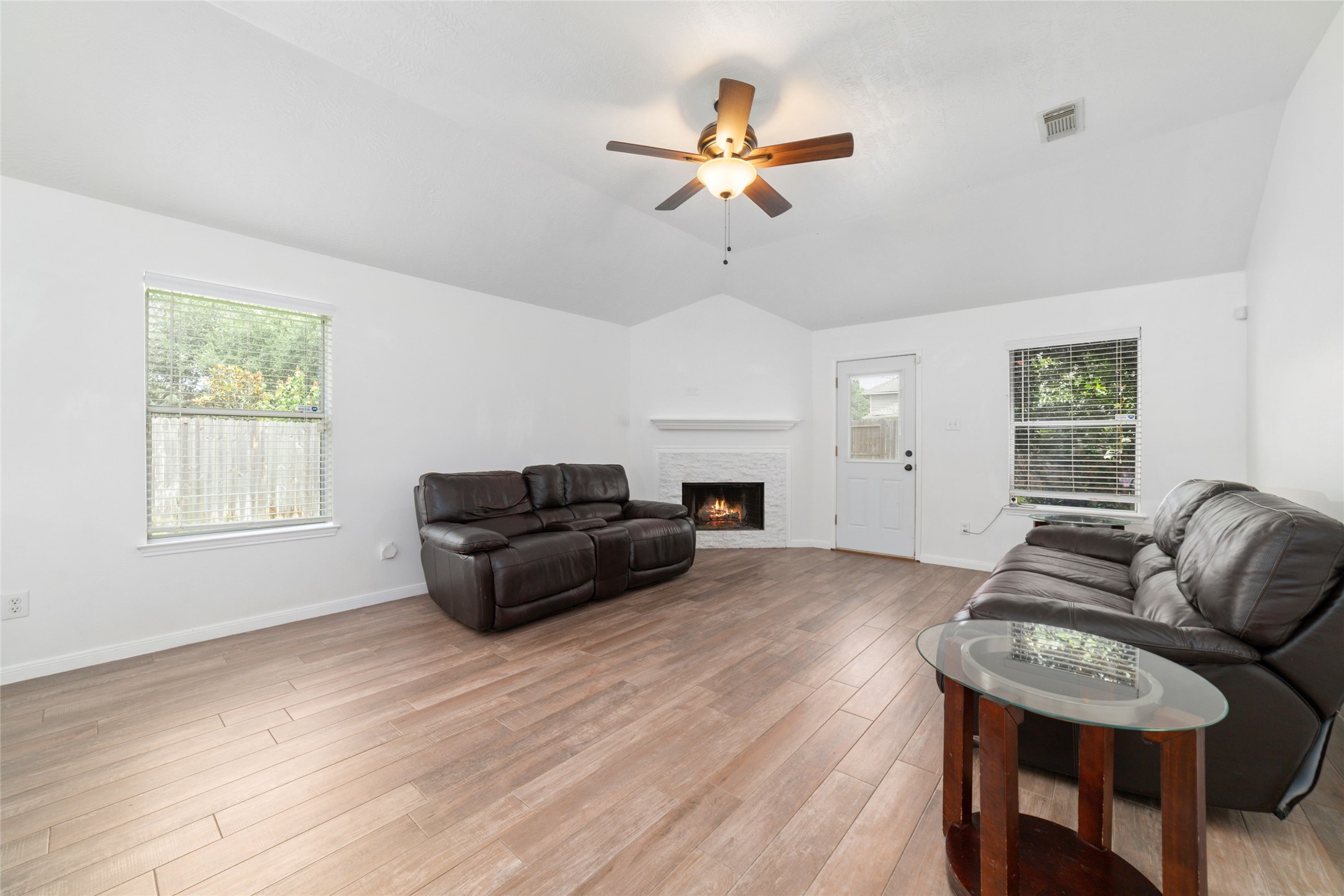 13605 Trail Meadow Lane Rosharon, TX 77583 - Photo 4 of 21 Living room with a fireplace