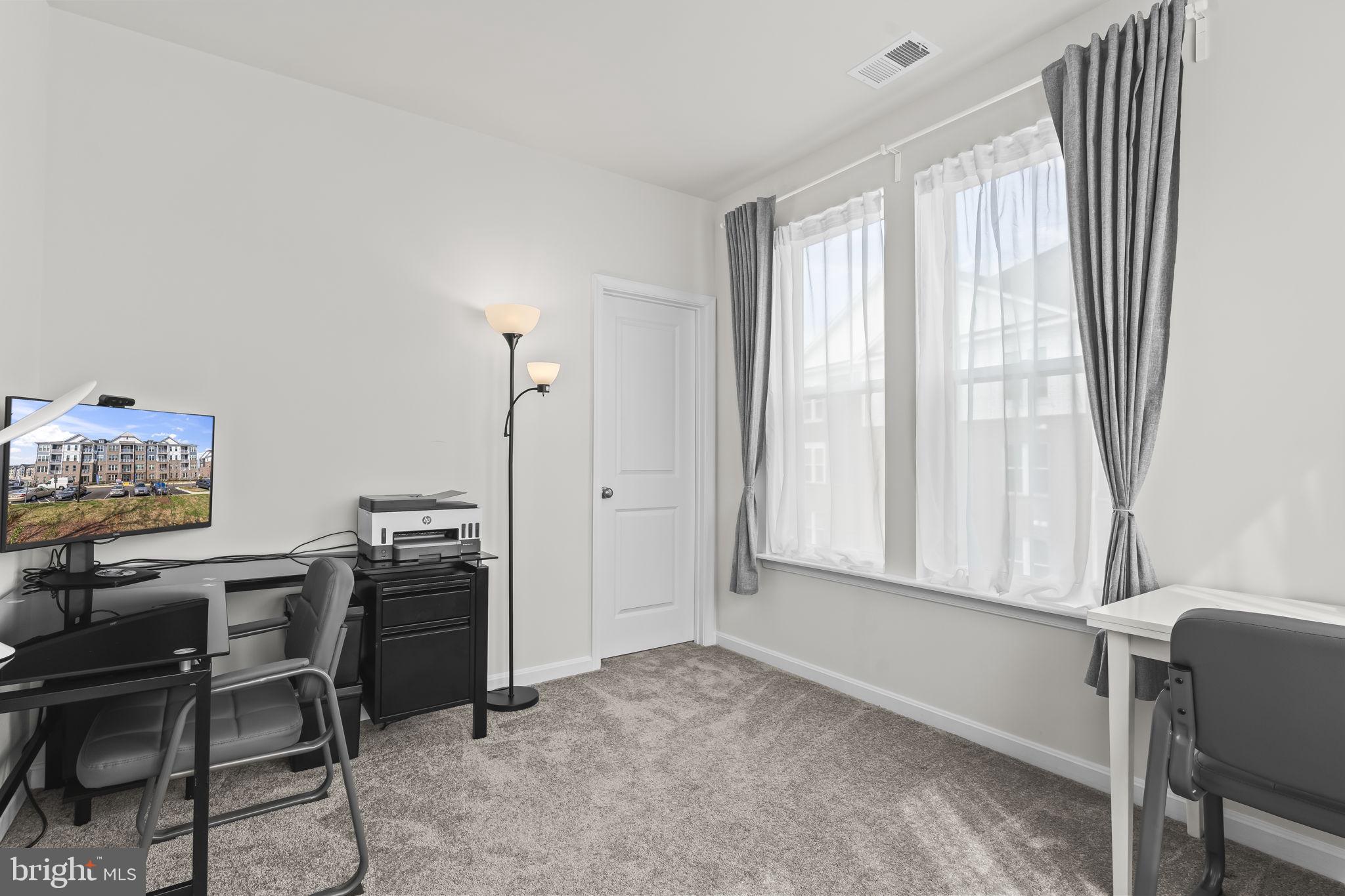 4007 Seaside Alder Road, Unit 8307 Bowie, MD 20720 - Photo 12 of 32 a view of workspace with furniture and window