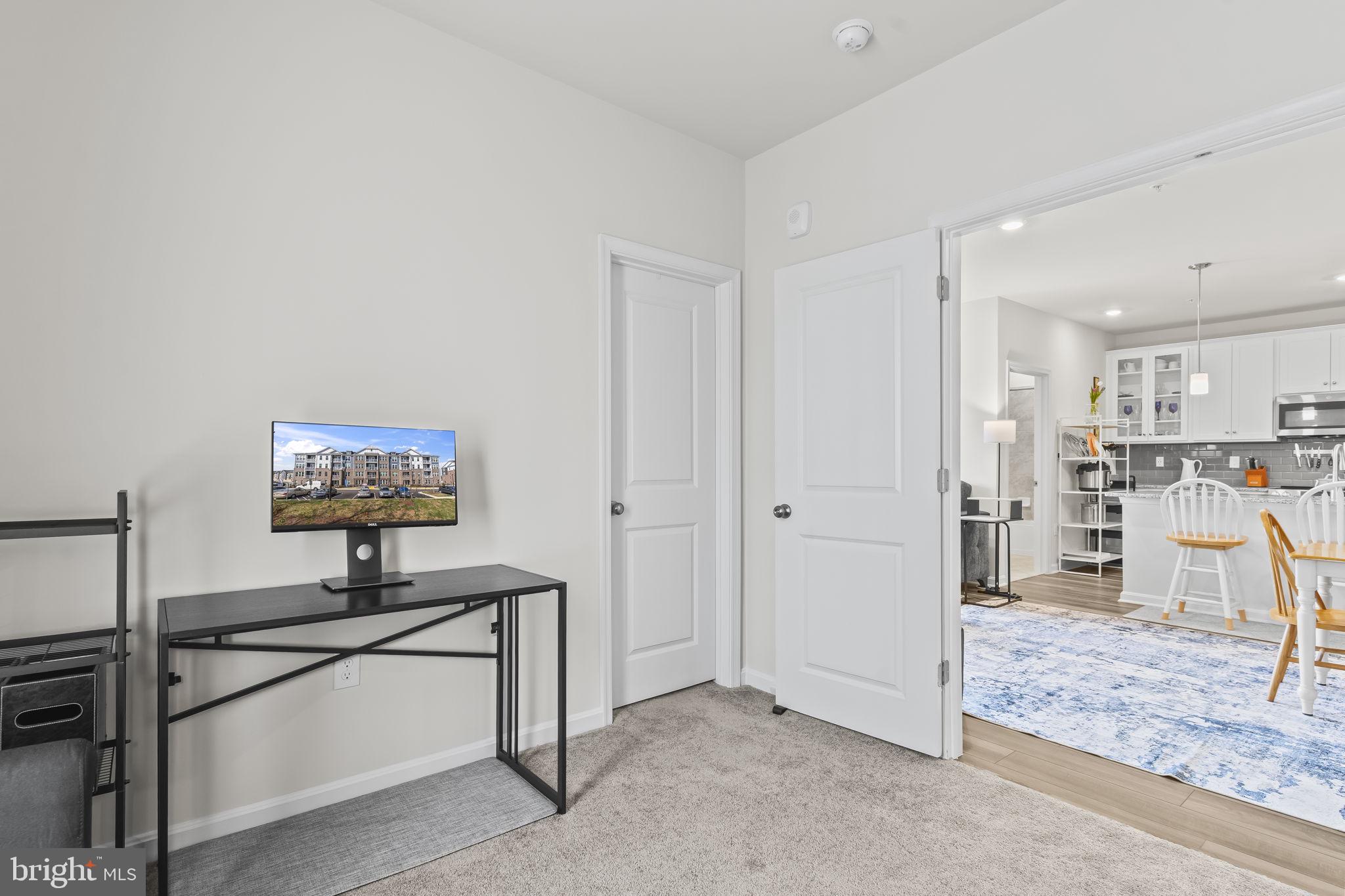 4007 Seaside Alder Road, Unit 8307 Bowie, MD 20720 - Photo 15 of 32 a view of work space with gym equipment