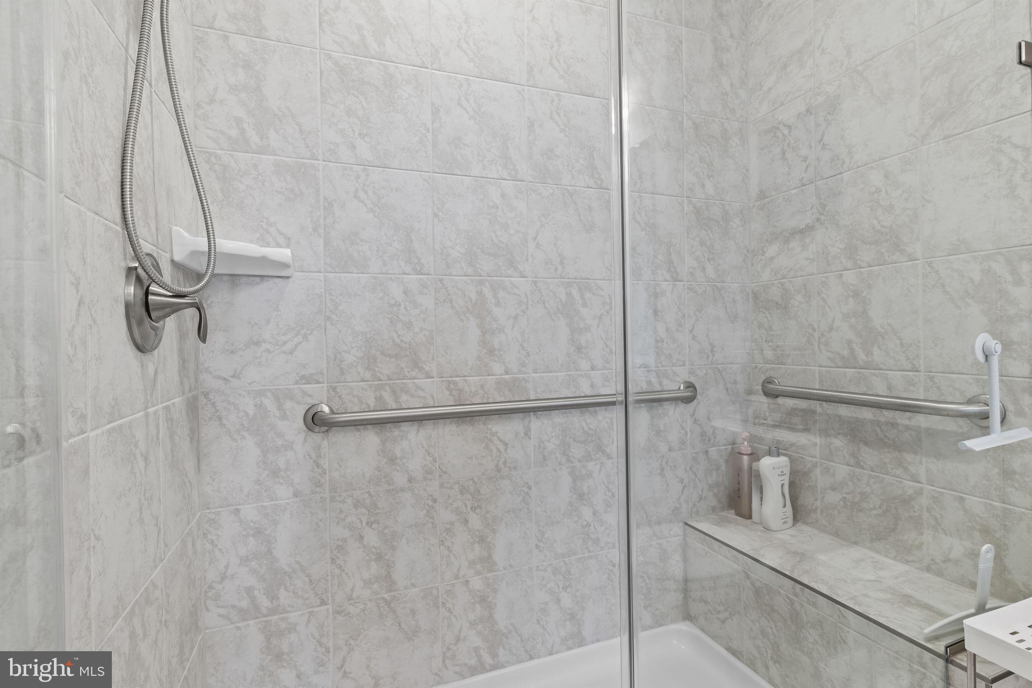 4007 Seaside Alder Road, Unit 8307 Bowie, MD 20720 - Photo 22 of 32 a bathroom with a shower