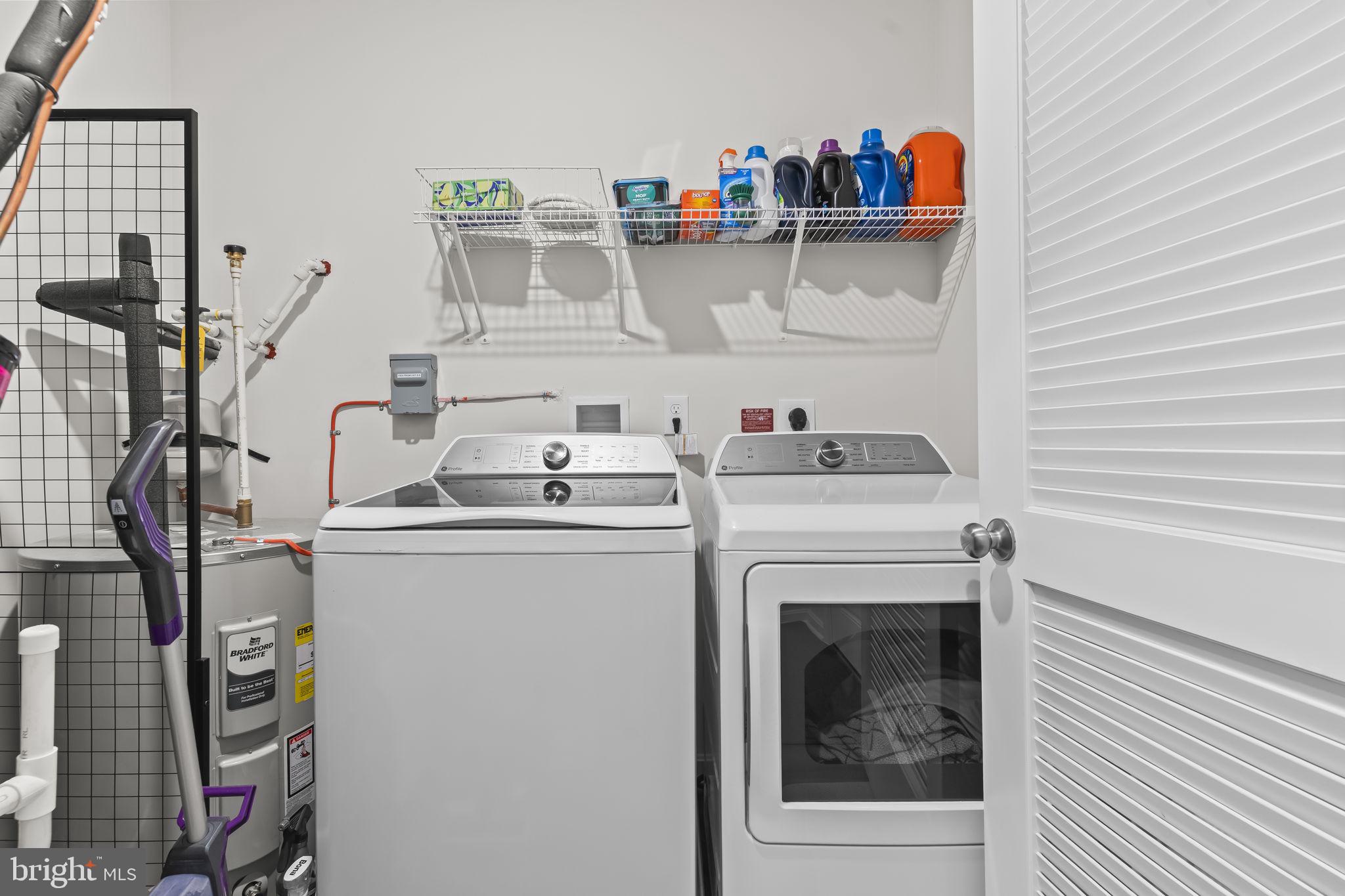 4007 Seaside Alder Road, Unit 8307 Bowie, MD 20720 - Photo 25 of 32 a utility room with dryer and washer