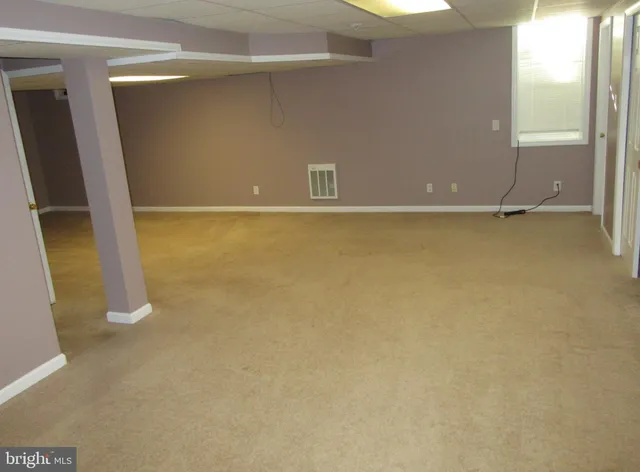 a view of an empty room with empty racks