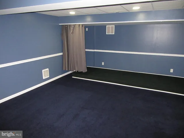 a view of a livingroom with a large window