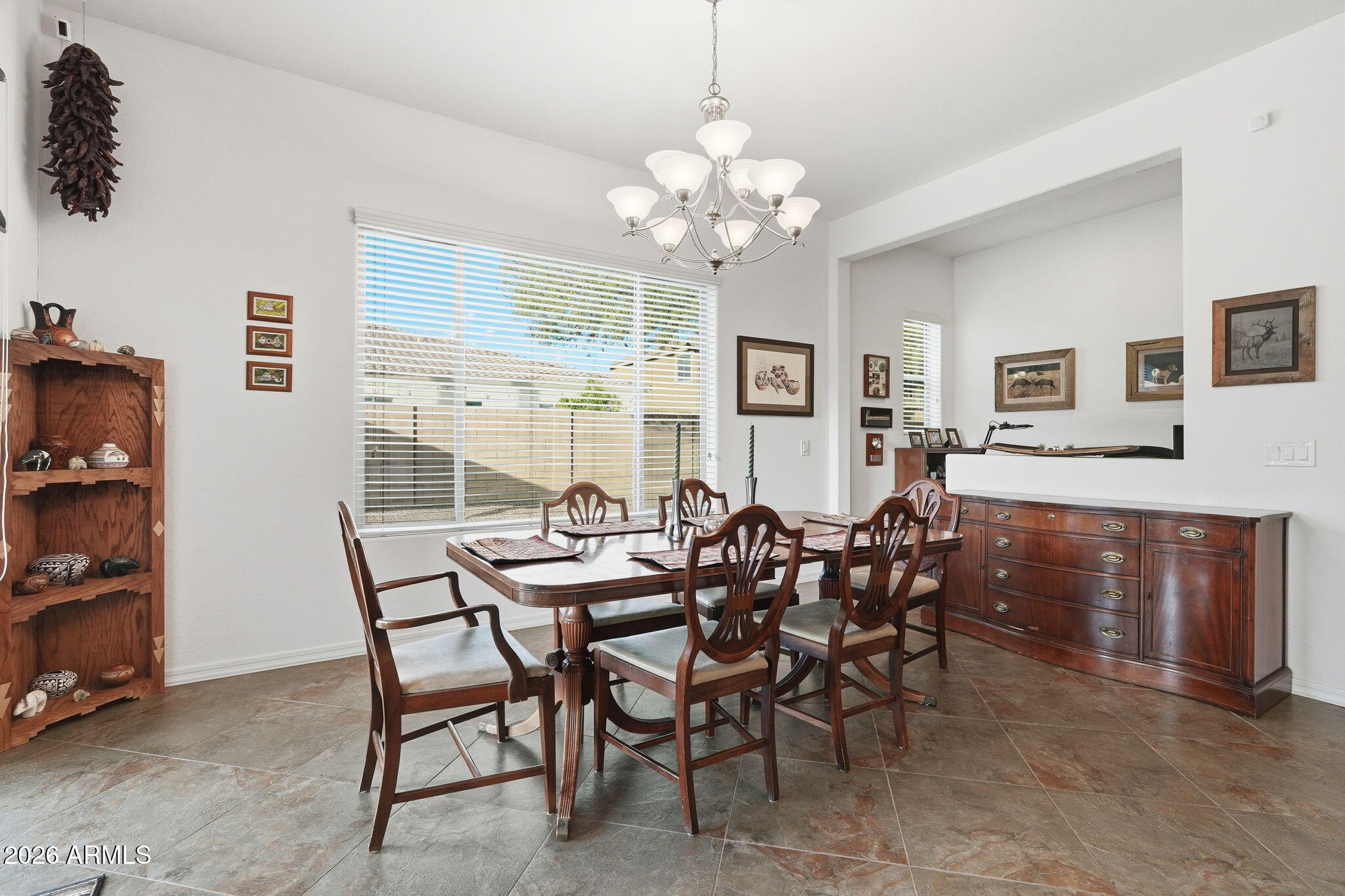 20066 East Russet Road Queen Creek, AZ 85142 - Photo 25 of 59 a view of a dining room with furniture and chandelier
