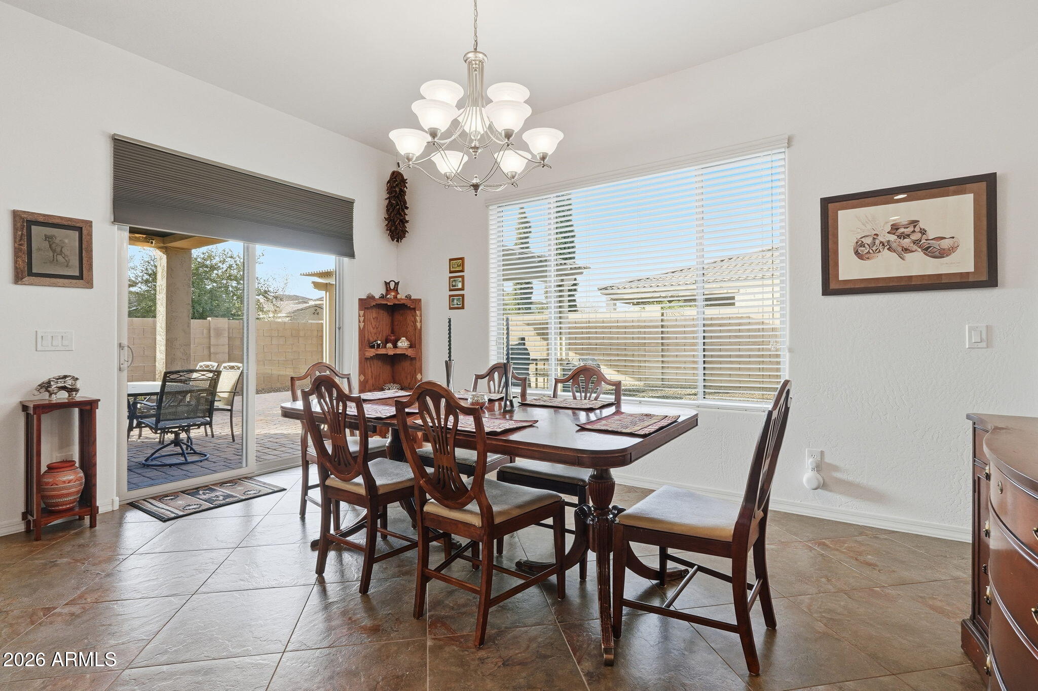 20066 East Russet Road Queen Creek, AZ 85142 - Photo 26 of 59 a view of a dining room with furniture window and outside view