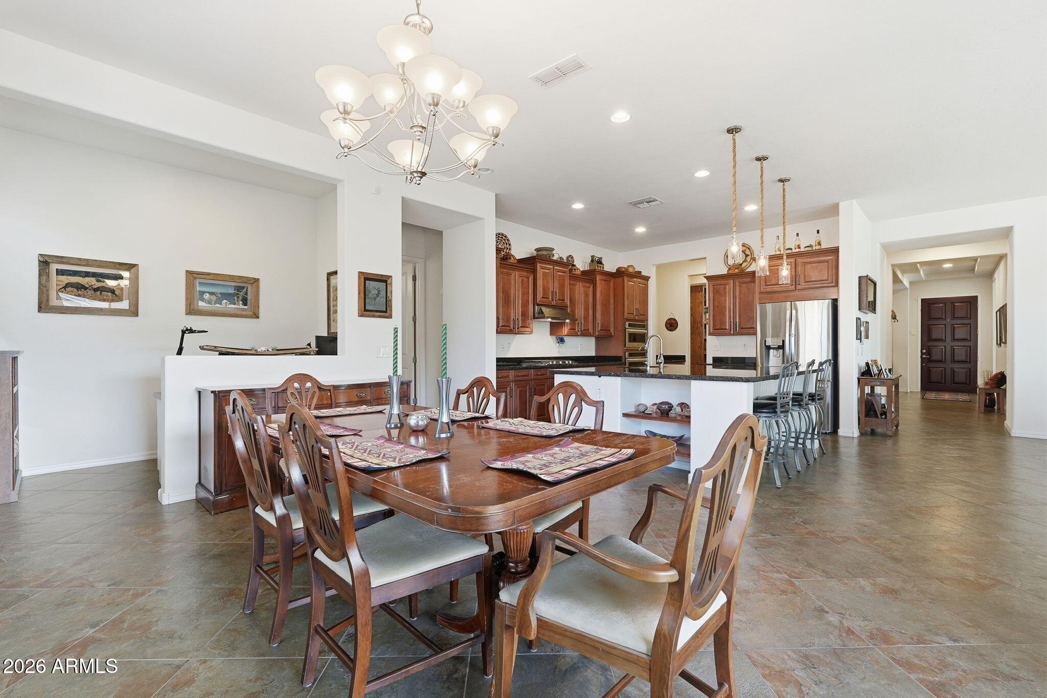 20066 East Russet Road Queen Creek, AZ 85142 - Photo 27 of 59 a view of a dining room with furniture and wooden floor