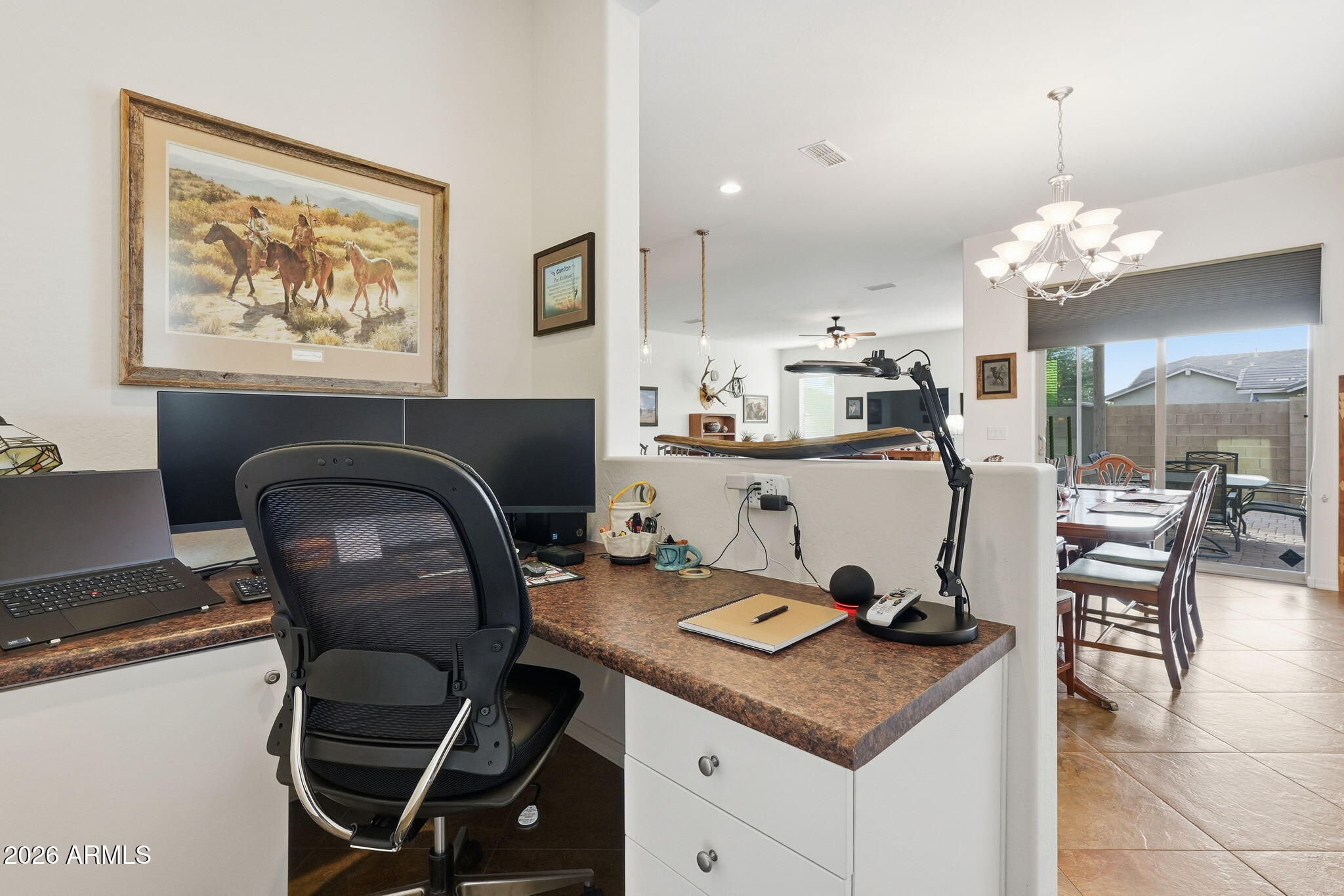 20066 East Russet Road Queen Creek, AZ 85142 - Photo 28 of 59 a living room with furniture a dining table and kitchen view