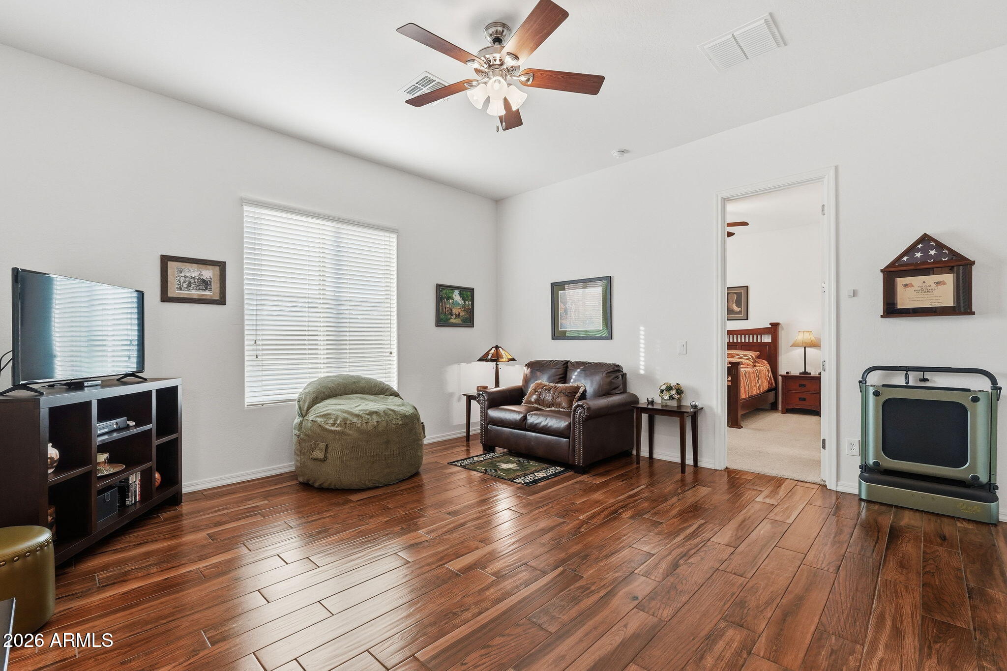 20066 East Russet Road Queen Creek, AZ 85142 - Photo 30 of 59 a living room with furniture and a fireplace