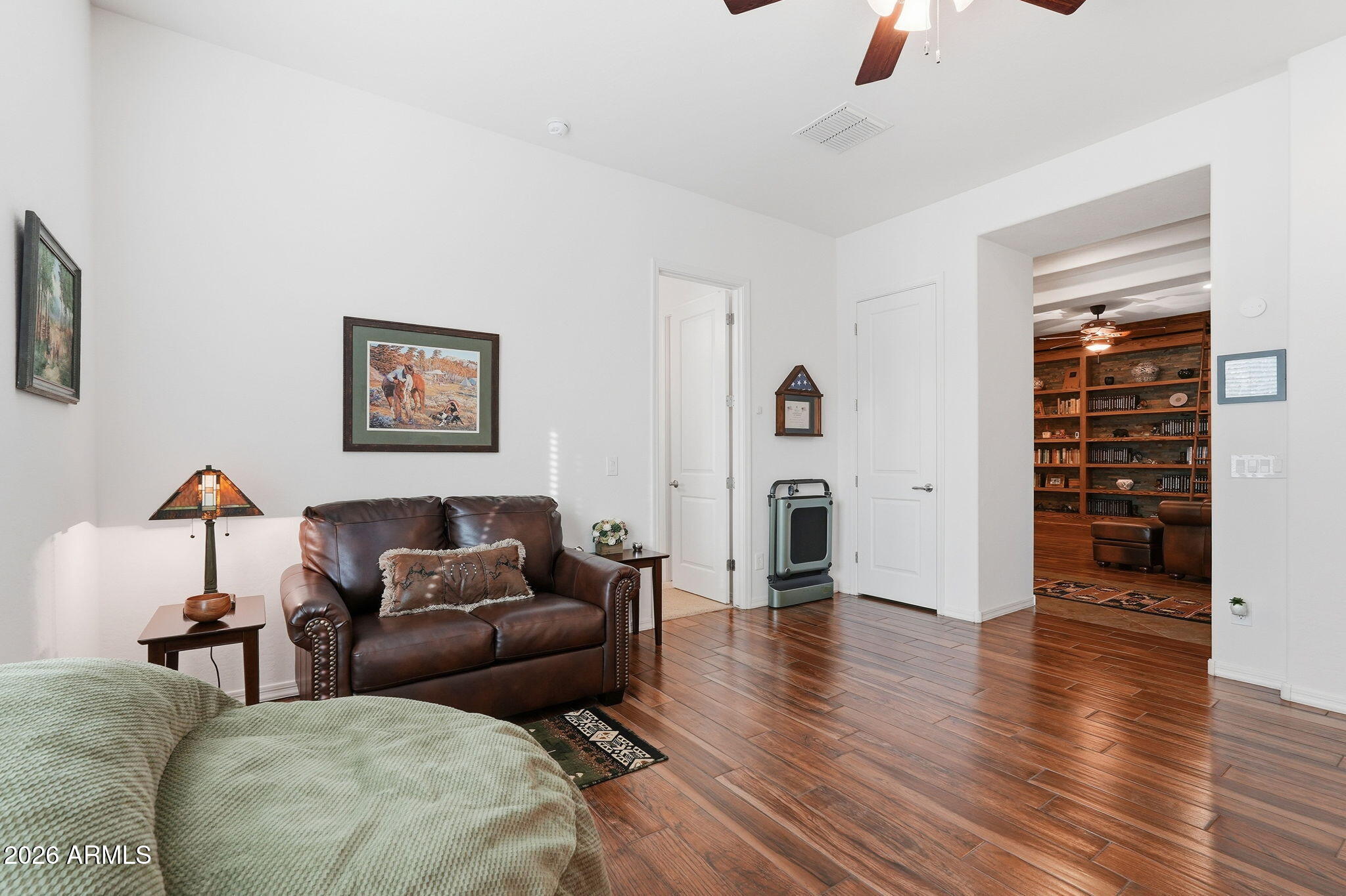 20066 East Russet Road Queen Creek, AZ 85142 - Photo 32 of 59 a living room with furniture and wooden floor