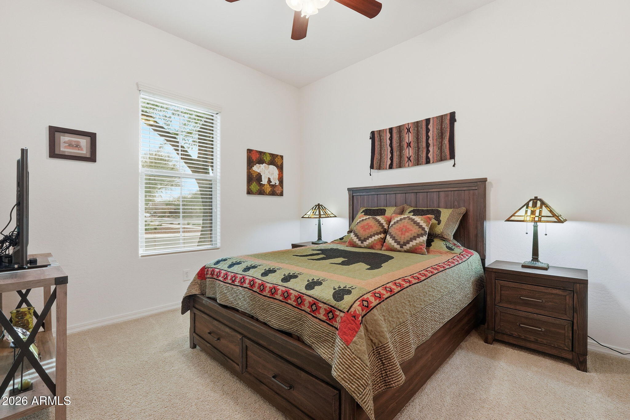 20066 East Russet Road Queen Creek, AZ 85142 - Photo 33 of 59 a bedroom with a bed and a window