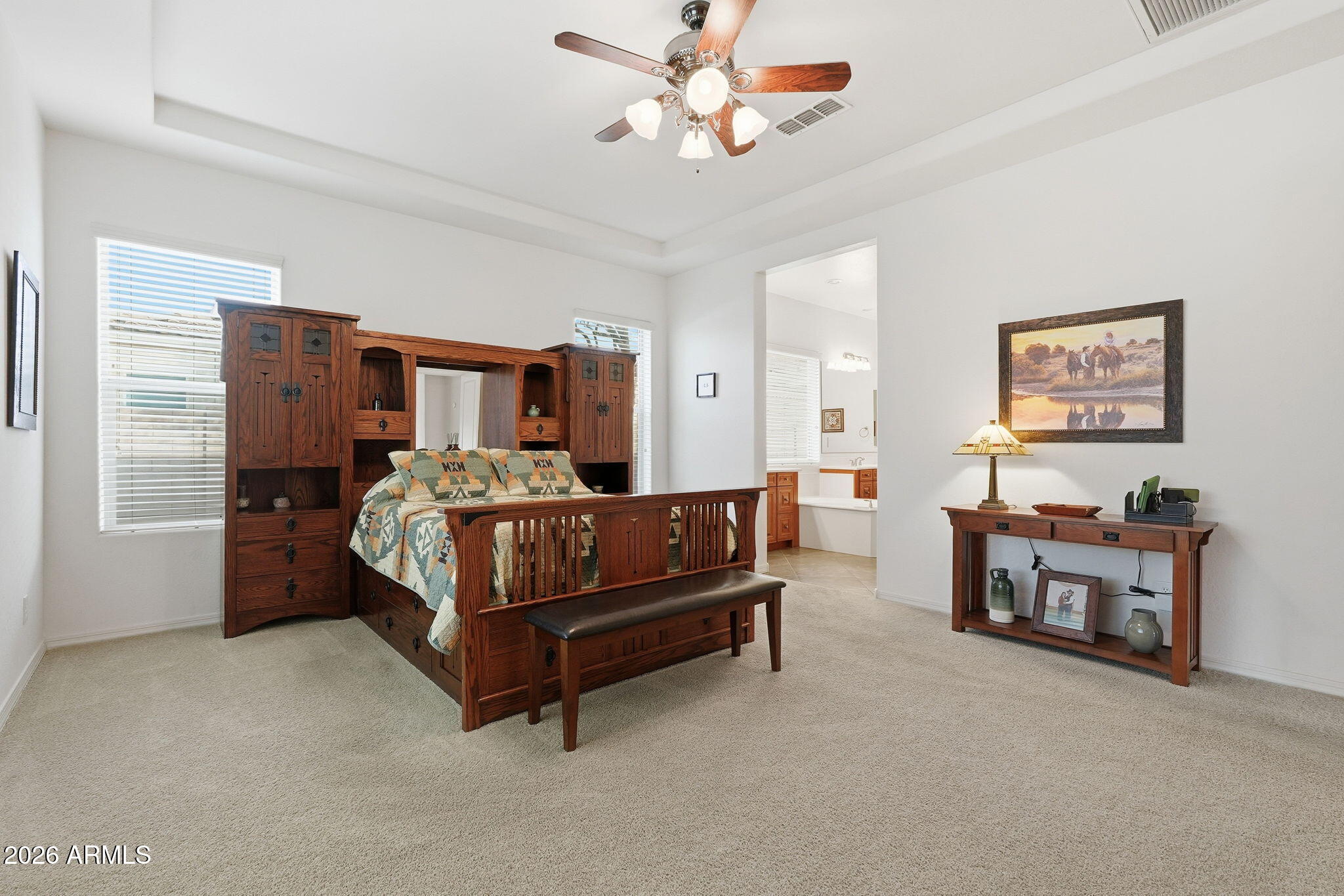20066 East Russet Road Queen Creek, AZ 85142 - Photo 38 of 59 a bedroom with a bed chandelier and a window