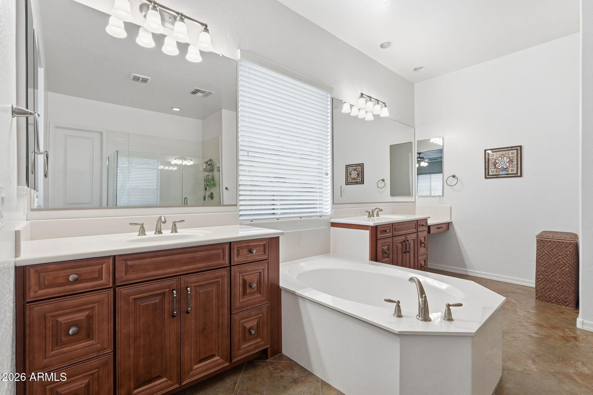 20066 East Russet Road Queen Creek, AZ 85142 - Photo 41 of 59 a bathroom with a tub double sink and mirror