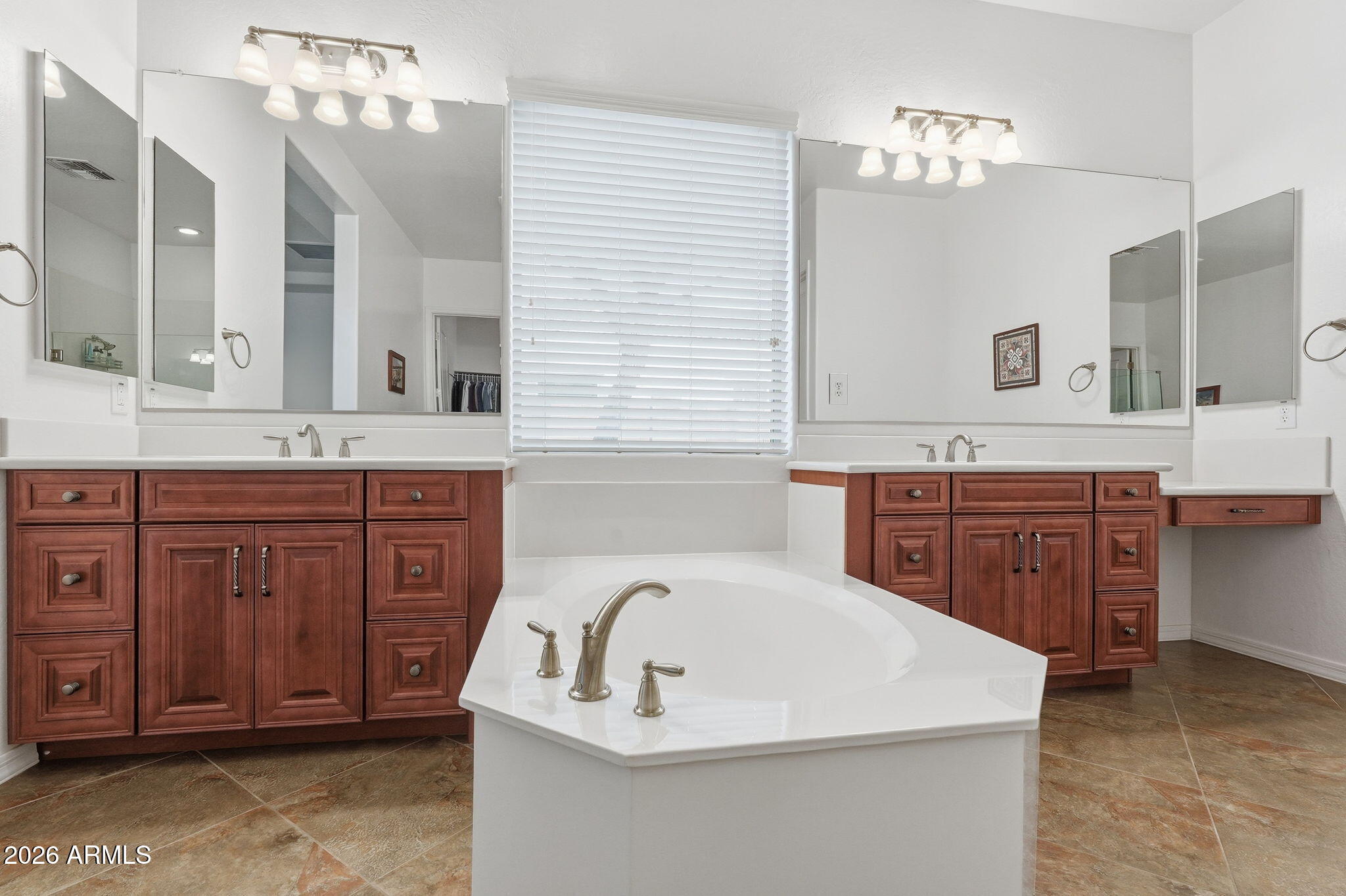 20066 East Russet Road Queen Creek, AZ 85142 - Photo 42 of 59 a bathroom with a sink a vanity and a mirror