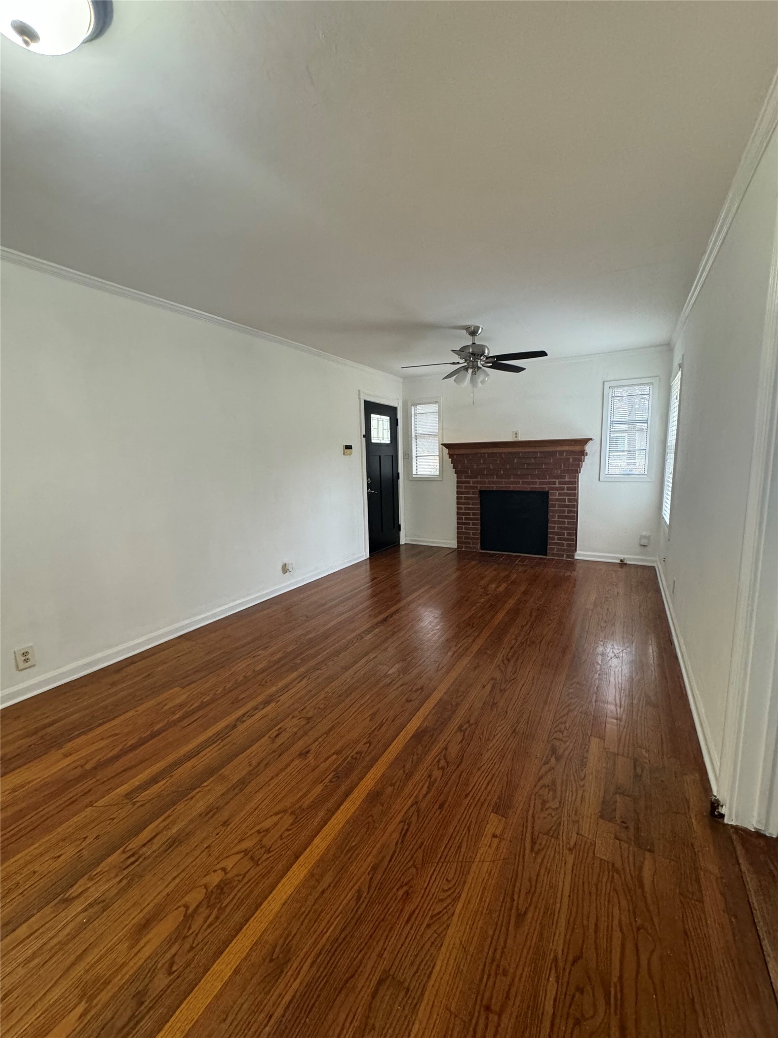 3405 Cherrywood Road Austin, TX 78722 - Photo 2 of 17 a view of empty room with wooden floor