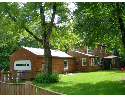 24 Pasho Road Billerica, MA 01821 - Photo 1 of 20 a front view of a house with garden