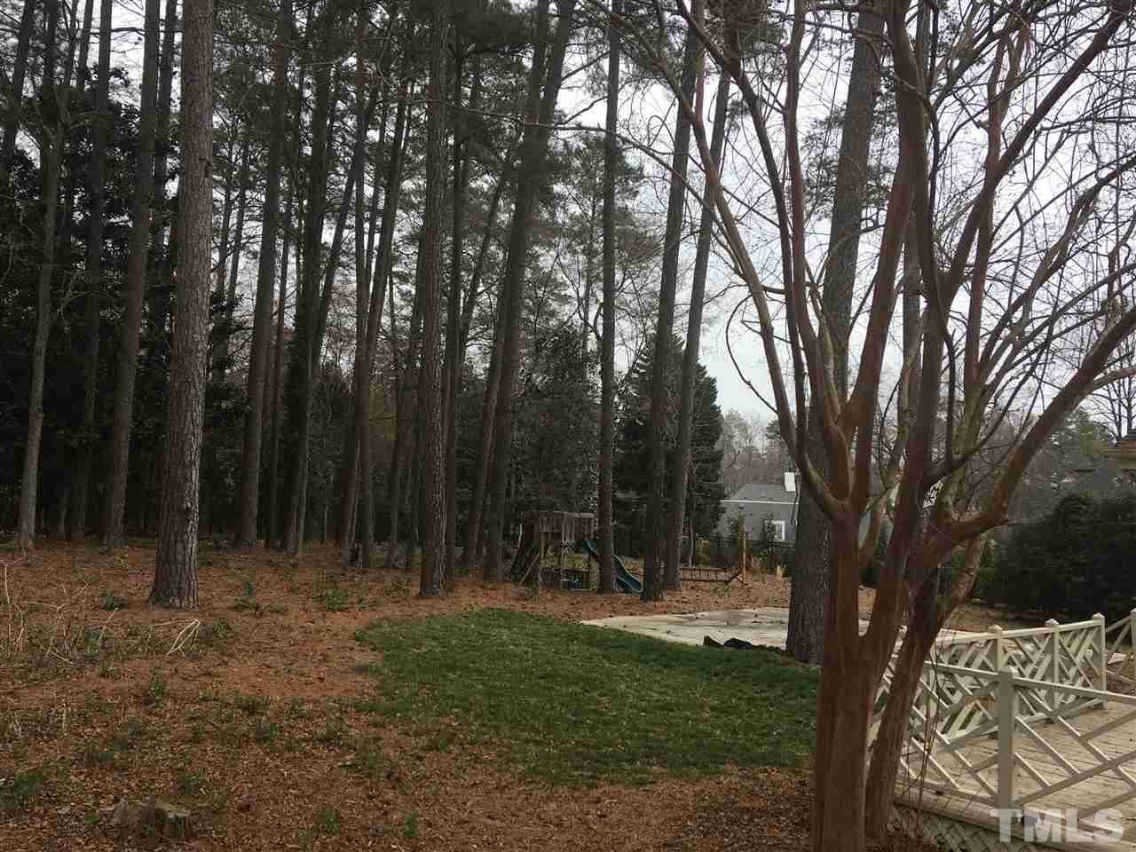 524 Marlowe Road Raleigh, NC 27609 - Photo 2 of 2 a view of outdoor space with green field and trees
