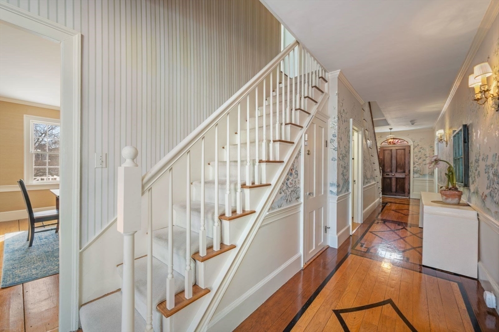 45 School Street Manchester, MA 01944 - Photo 16 of 42 a view of entryway and hall with wooden floor