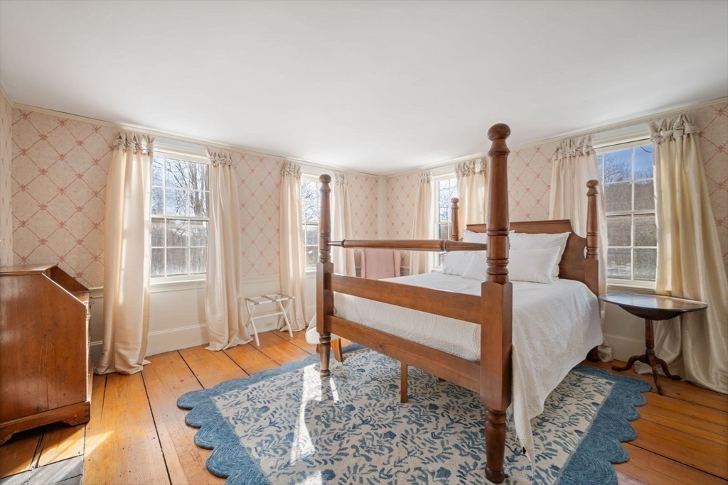 45 School Street Manchester, MA 01944 - Photo 27 of 42 a bedroom with furniture and a rug